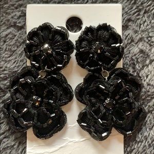 Beaded black earrings.